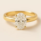 Gold Oval Diamond Ring - The Isolde Ring - Dainty London oval diamond ring, ethical lab-grown diamond, engagement ring, sustainable luxury jewellery, heirloom quality ring, gold diamond ring, custom engagement ring, GIA certified diamond, elegant wedding ring, modern heirloom ring, ethical gold jewellry, luxury gift for her, romantic anniversary gift