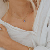 blue topaz necklace, vermeil gemstone jewellery, elegant pendant gift, special occasion jewellery, sterling silver necklace, gift for her, boho style necklace, engagement jewelry, handcrafted gemstone pendant, water-inspired jewelry, dainty topaz necklace, anniversary gift ideas, unique silver jewelry