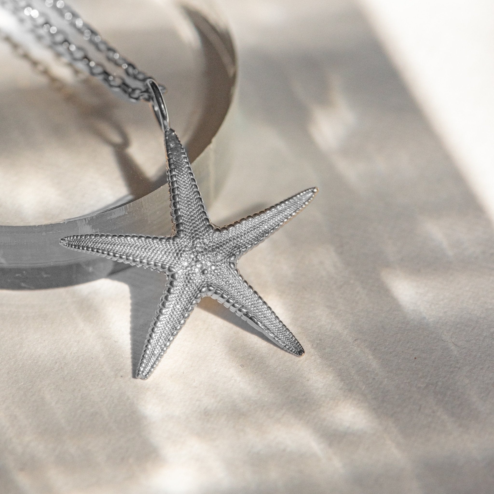 beach jewellery, starfish necklace, ocean charm, nautical jewellery, sea lover gift, sterling silver necklace, nature inspired jewelry, seaside accessory, coastal jewelry, beach gift for her, handcrafted sea charm, summer jewelry, ocean lover gift