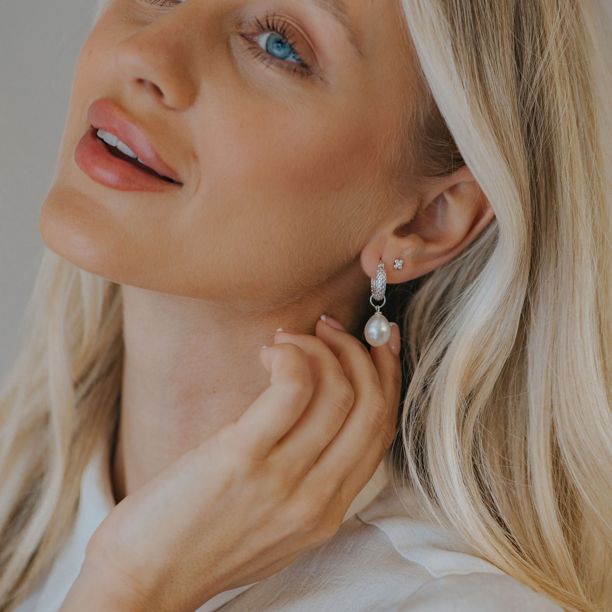 Silver Pearl Drop Earrings - Dainty London silver pearl earrings, freshwater pearl hoops, bridesmaid jewellery, wedding guest earrings, sterling silver jewellry, pearl drop earrings, elegant pearl jewelry, gift for bridesmaids, bridal earrings, ocean blue jewelry box, timeless jewellery gift, hand crafted pearl earrings, versatile jewelry pieces