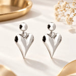 Gold or Silver Heart Drop Stud Earrings for everyday wear, stylish jewellery gift for women, made with intricate details and timeless design. Jewellery under 50