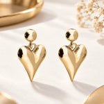 Gold or Silver Heart Drop Stud Earrings for everyday wear, stylish jewellery gift for women, made with intricate details and timeless design. Jewellery under 50