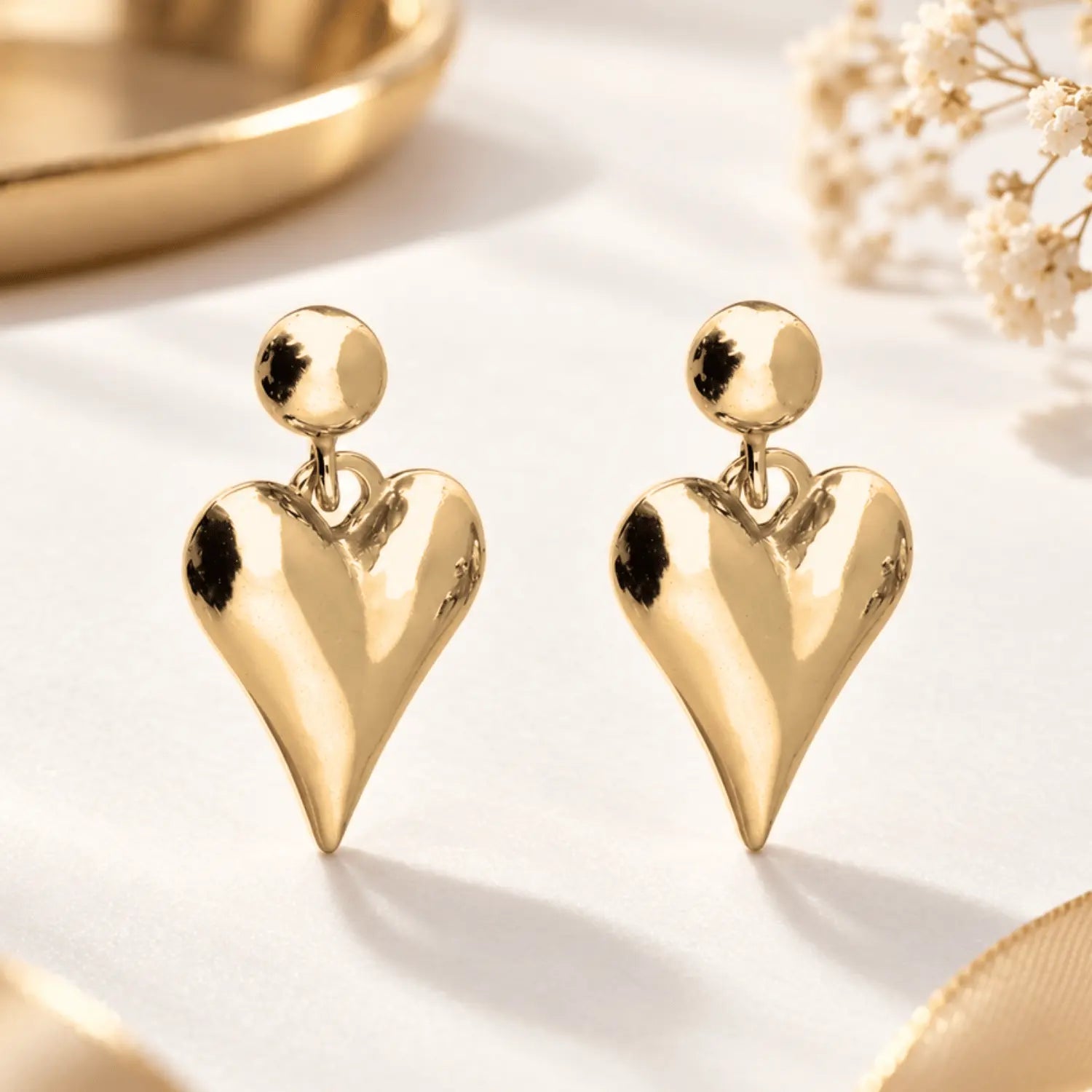 Gold or Silver Heart Drop Stud Earrings for everyday wear, stylish jewellery gift for women, made with intricate details and timeless design. Jewellery under 50
