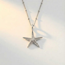 Dainty Silver Starfish Necklace - Dainty London Coastal jewellery gift, ocean jewelry, handmade seaside necklace, sterling silver starfish, reslient ocean pendant, layered sea jewellry, starfish jewelry gift, beach lover gift, nature inspired jewelry, everyday coastal necklace, summer jewellery gift, meaningful sea gift