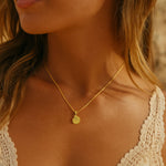 gold fossil necklace, gold pendant, ammonite jewellery, beach inspired jewelry, summer jewellry gift, eco friendly jewelry, handcrafted nature jewellery, fossil lover gift, seaside necklace, lightweight silver chain, unique gift for her, handmade beach jewellery