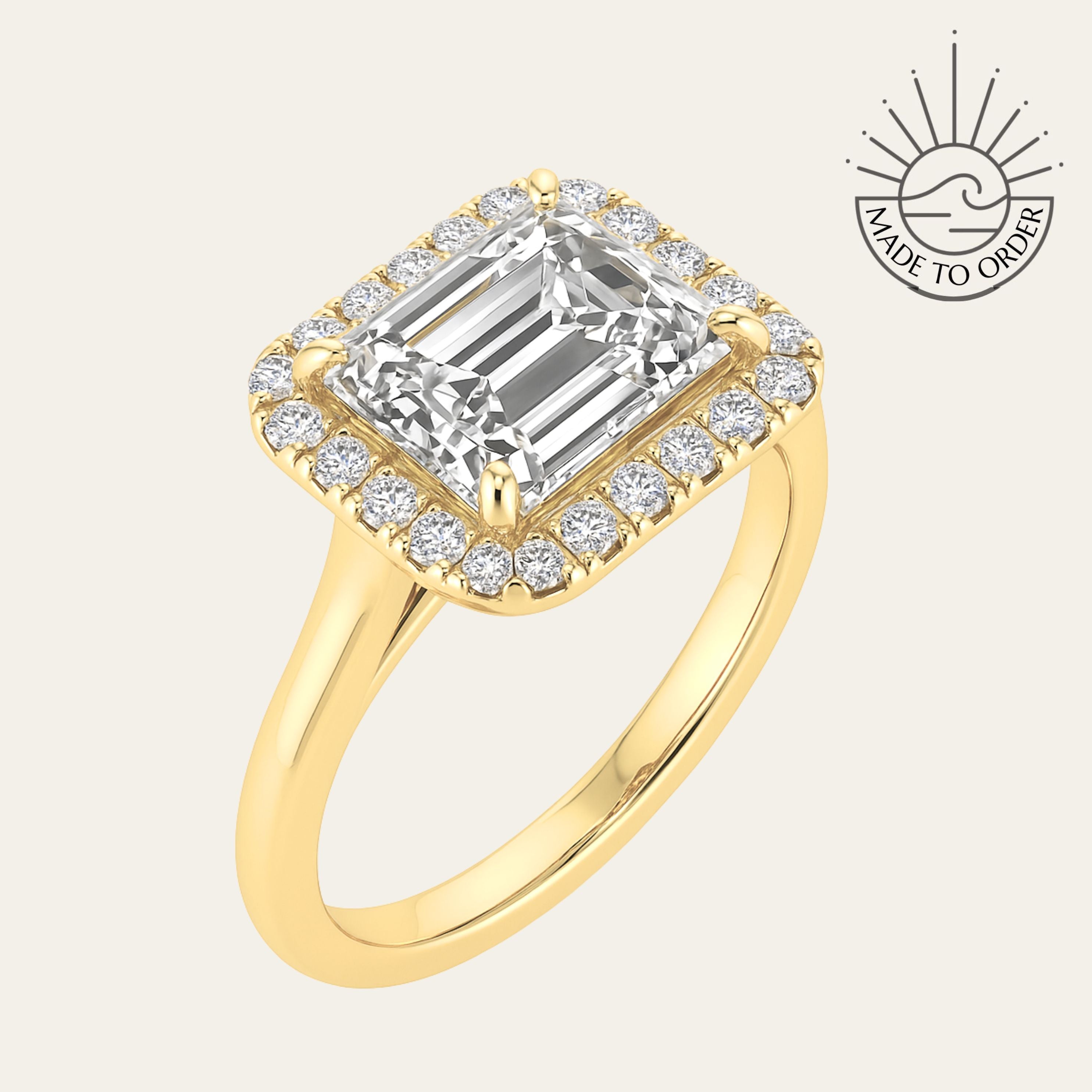 18ct gold engagement ring, emerald cut diamond ring, halo engagement ring, handmade wedding ring, ethical diamond ring, modern bridal jewelry, geometric engagement ring, handcrafted England ring, sustainable wedding band, anniversary gift, luxury engagement ring, contemporary bridal ring, elegant diamond ring