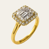 18ct gold engagement ring, emerald cut diamond ring, halo engagement ring, handmade wedding ring, ethical diamond ring, modern bridal jewelry, geometric engagement ring, handcrafted England ring, sustainable wedding band, anniversary gift, luxury engagement ring, contemporary bridal ring, elegant diamond ring