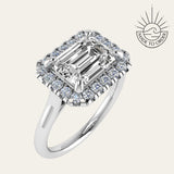 white gold engagement ring, emerald cut diamond ring, halo engagement ring, handmade wedding ring, ethical diamond ring, modern bridal jewelry, geometric engagement ring, handcrafted England ring, sustainable wedding band, anniversary gift, luxury engagement ring, contemporary bridal ring, elegant diamond ring