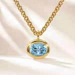 blue topaz necklace, sky blue gemstone jewellery, gold vermeil necklace, sterling silver pendant, statement chain necklace, handcrafted gold jewelry, eco-friendly necklace, layered jewelry piece, gift for her, boho chic necklace, beach style jewelry, summer accessories, special occasion gift