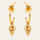 gold vermeil earrings, celestial hoop jewellery, coastal inspired earrings, dainty gemstone hoops, wedding jewellry jewelry, British jewellery design, lunar celestial earrings, gift for her, boho coastal earrings, lightweight gemstone hoops, statement everyday jewellery, topaz gemstone earrings, natural marine texture jewelry