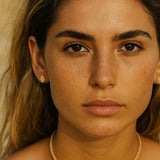 Gold vermeil celestial stud earrings with white topaz gems. British coastal-inspired design, perfect bridal bridesmaid wedding jewellery & everyday dainty studs