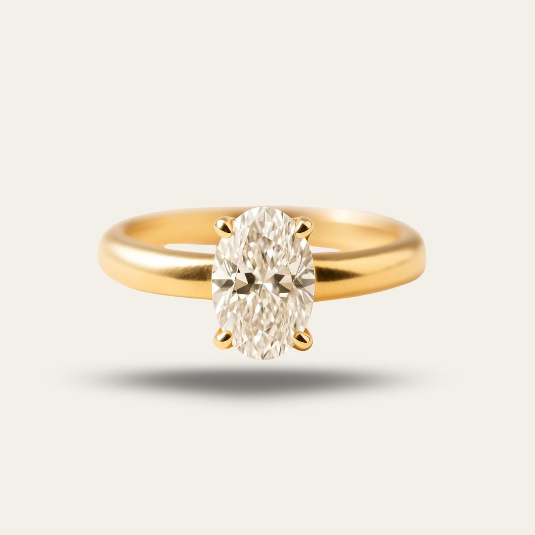 Gold Oval Diamond Ring - The Isolde Ring - Dainty London oval diamond ring, ethical lab-grown diamond, engagement ring, sustainable luxury jewellery, heirloom quality ring, gold diamond ring, custom engagement ring, GIA certified diamond, elegant wedding ring, modern heirloom ring, ethical gold jewellry, luxury gift for her, romantic anniversary gift