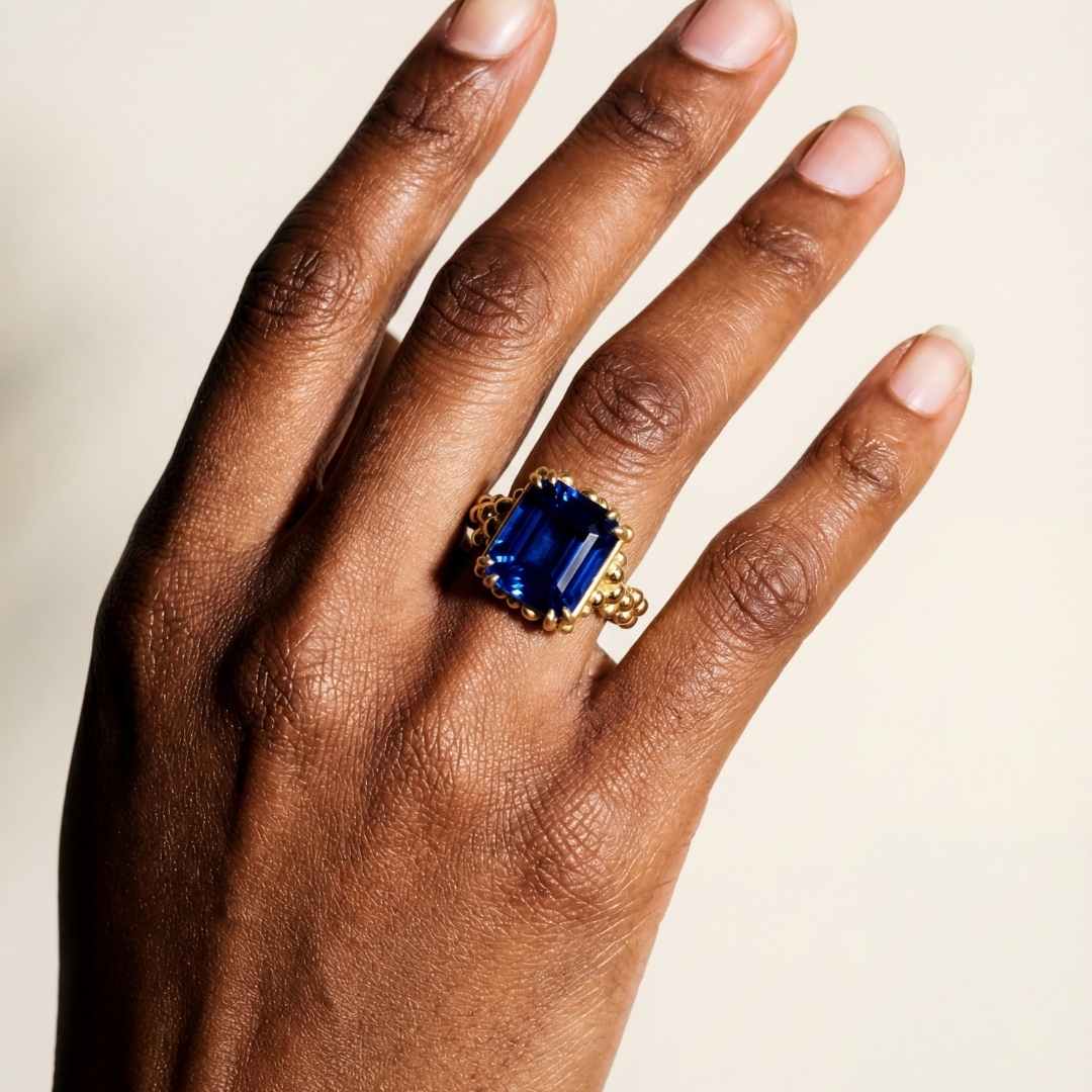 sapphire cocktail ring, eco-friendly jewellery, ocean inspired ring, sustainable sapphire ring, deep blue gemstone, handmade Sapphire jewellry, octagonal sapphire ring, eco-conscious gift, ocean theme jewelry, British craftsmanship, unique statement ring, bold cocktail ring, gift for her
