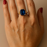 sapphire cocktail ring, eco-friendly jewellery, ocean inspired ring, sustainable sapphire ring, deep blue gemstone, handmade Sapphire jewellry, octagonal sapphire ring, eco-conscious gift, ocean theme jewelry, British craftsmanship, unique statement ring, bold cocktail ring, gift for her