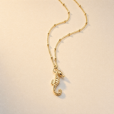 seahorse jewelry, ocean necklace, sea life pendant, marine inspired gift, handmade silver necklace, gold vermeil jewelry, beach lover gift, nautical accessories, ocean lover gift, childhood wonder jewelry, handcrafted seahorse, delicate sea jewelry, coastal fashion jewelry
