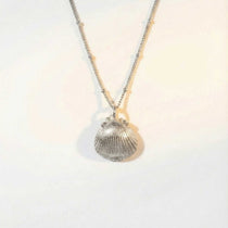 Dainty Silver Seashell Necklace - Dainty London sea shell necklace, coastal jewellery, ocean pendant, shell jewellry gift, minimalist seaside jewelry, silver ocean necklace, handmade beach jewelry, gift for sea lovers, Cornish inspired jewelry, star charm necklace, everyday coastal piece, sustainable jewelry gift, ocean lover gift