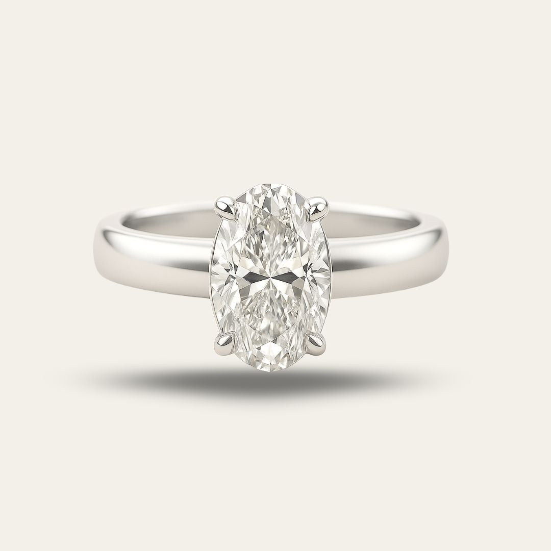Platinum Oval Diamond Ring - The Isolde Ring - Dainty London platinum oval diamond ring, ethical lab-grown diamond, modern engagement ring, GIA certified diamond, luxury promise ring, contemporary anniversary jewellery, sustainable fine jewellry, oval cut diamond ring, ethical engagement gift, handcrafted diamond ring, timeless woman’s ring, special occasion jewelry, elegant promise ring