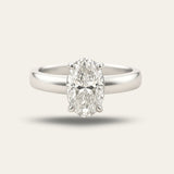 Platinum Oval Diamond Ring - The Isolde Ring - Dainty London platinum oval diamond ring, ethical lab-grown diamond, modern engagement ring, GIA certified diamond, luxury promise ring, contemporary anniversary jewellery, sustainable fine jewellry, oval cut diamond ring, ethical engagement gift, handcrafted diamond ring, timeless woman’s ring, special occasion jewelry, elegant promise ring
