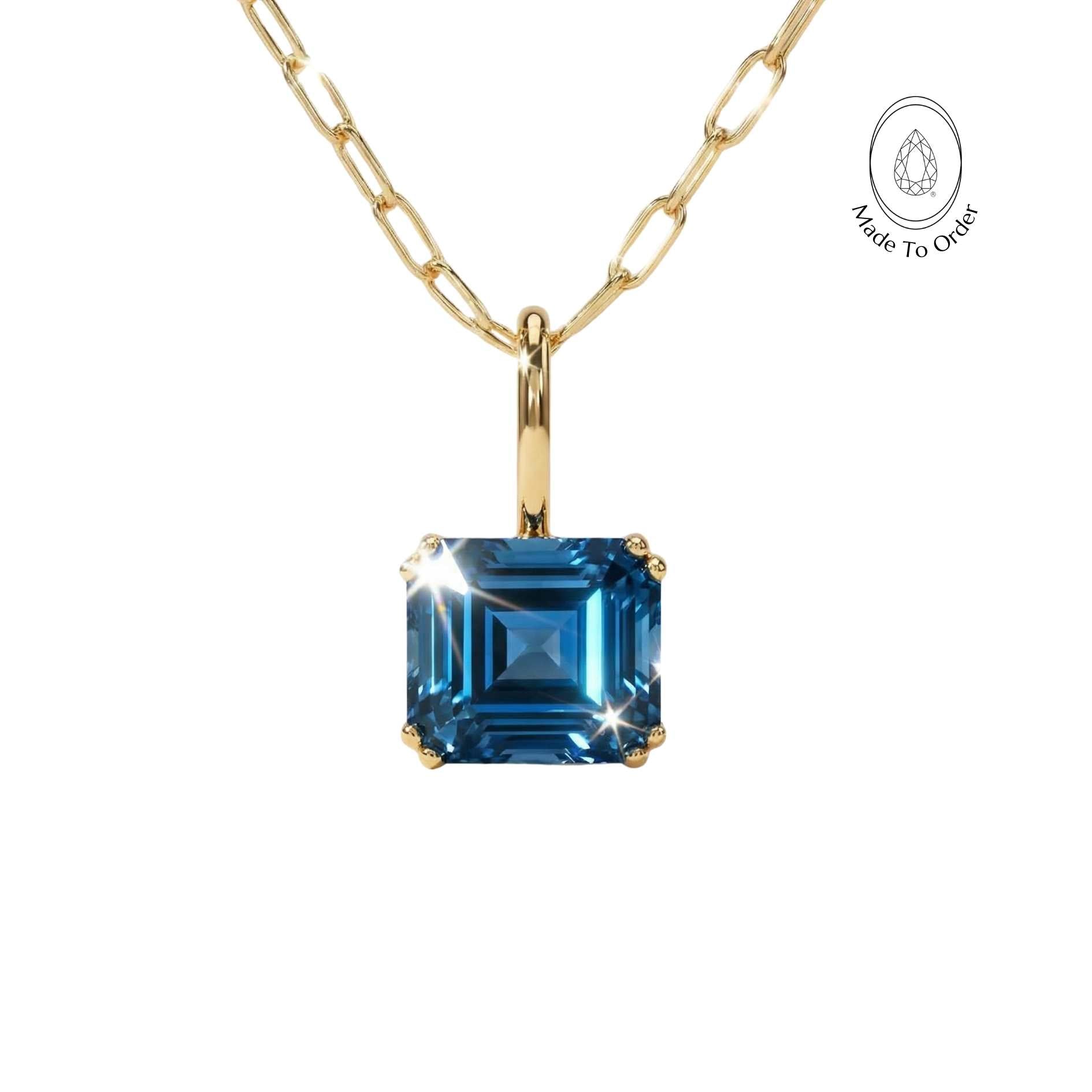 Solid Gold Large London Blue Topaz Necklace - Cleodora, Sea-Inspired Pendant solid gold necklace, blue topaz jewelry, ocean-inspired necklace, sea theme jewelry, handmade gold pendant, adjustable chain necklace, luxury gemstone gift, nautical jewelry, beach lover gift, everyday elegant necklace, unique gemstone jewelry, ethical jewelry gift, statement gold necklace
