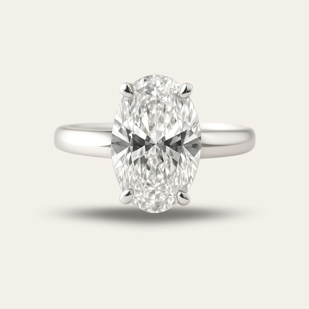 Statement Platinum Oval Diamond Ring - The Nadira Ring - Dainty London platinum diamond ring, oval diamond ring, lab-grown diamond, modern vintage jewellery, engagement ring, luxury diamond ring, ethical diamond ring, special occasion gift, anniversary ring, sustainable jewellry, GIA certified diamond, statement jewelry, timeless engagement ring