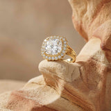 platinum diamond ring, gold cushion halo ring, engagement statement ring, luxury diamond jewelry, heirloom engagement ring, 4 carat diamond ring, modern diamond ring, special occasion jewelry, sustainable engagement ring, princess cut halo, anniversary gift jewelry, bridal ring, ethical diamond ring