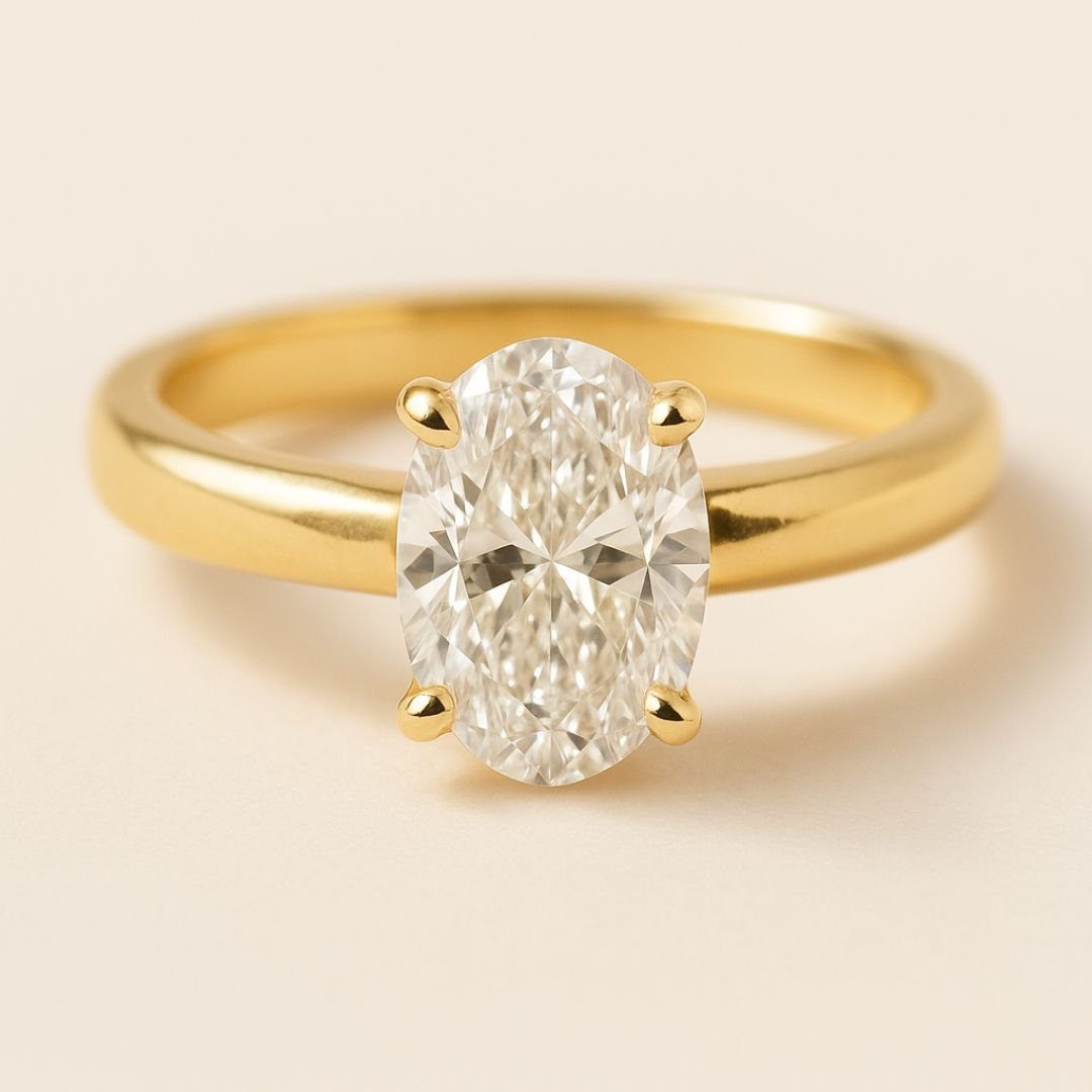 Gold Oval Diamond Ring - The Isolde Ring - Dainty London oval diamond ring, ethical lab-grown diamond, engagement ring, sustainable luxury jewellery, heirloom quality ring, gold diamond ring, custom engagement ring, GIA certified diamond, elegant wedding ring, modern heirloom ring, ethical gold jewellry, luxury gift for her, romantic anniversary gift