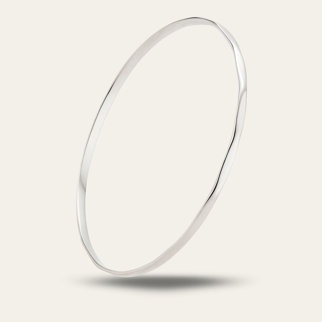 Dainty Silver Faceted Bangle - Dainty London silver bangle, dainty sterling silver, minimalist jewellery, eco friendly jewellry, stacking bracelet, everyday silver jewelry, lightweight bangle, delicate silver bracelet, recycled silver jewellery, versatile jewellery, gift for her, modern minimalist jewelry, understated jewelry