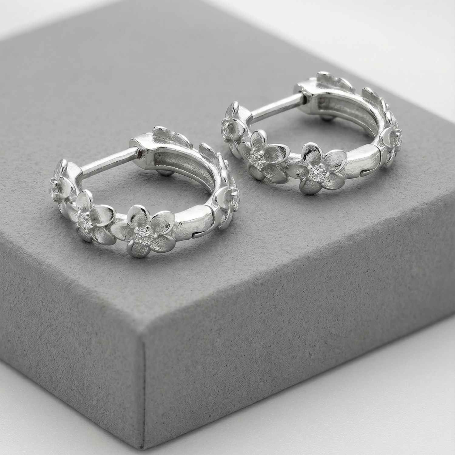 Dainty Sterling Silver Flower Huggie Hoops - Dainty London