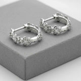 Dainty Sterling Silver Flower Huggie Hoops - Dainty London