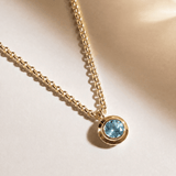 blue topaz necklace, sky blue gemstone jewellery, gold vermeil necklace, sterling silver pendant, statement chain necklace, handcrafted gold jewelry, eco-friendly necklace, layered jewelry piece, gift for her, boho chic necklace, beach style jewelry, summer accessories, special occasion gift