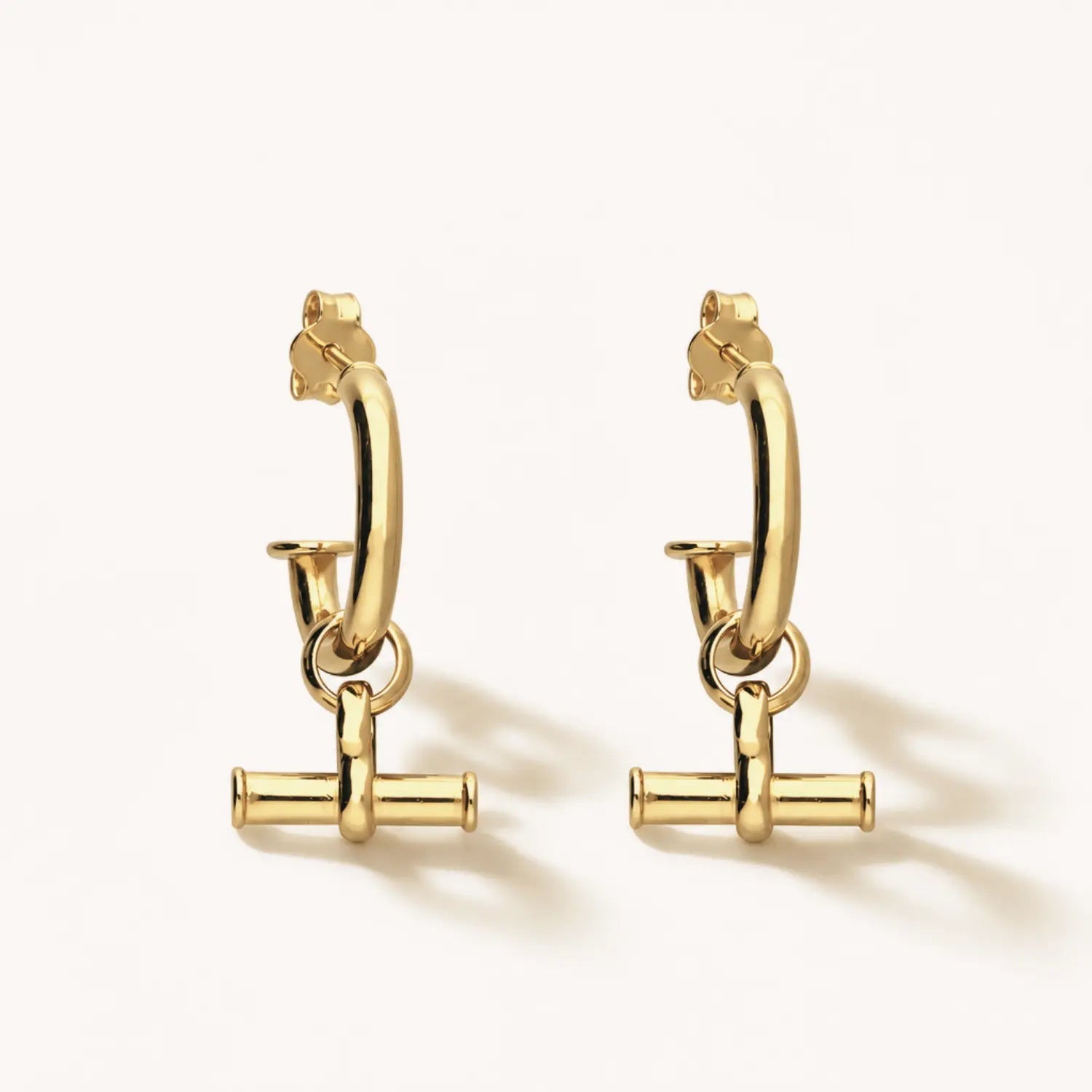 Shop T Bar Half Hoop Stud Earrings in gold vermeil or sterling silver. Minimal, handmade and perfect for everyday wear or layering. Free UK delivery over £75.