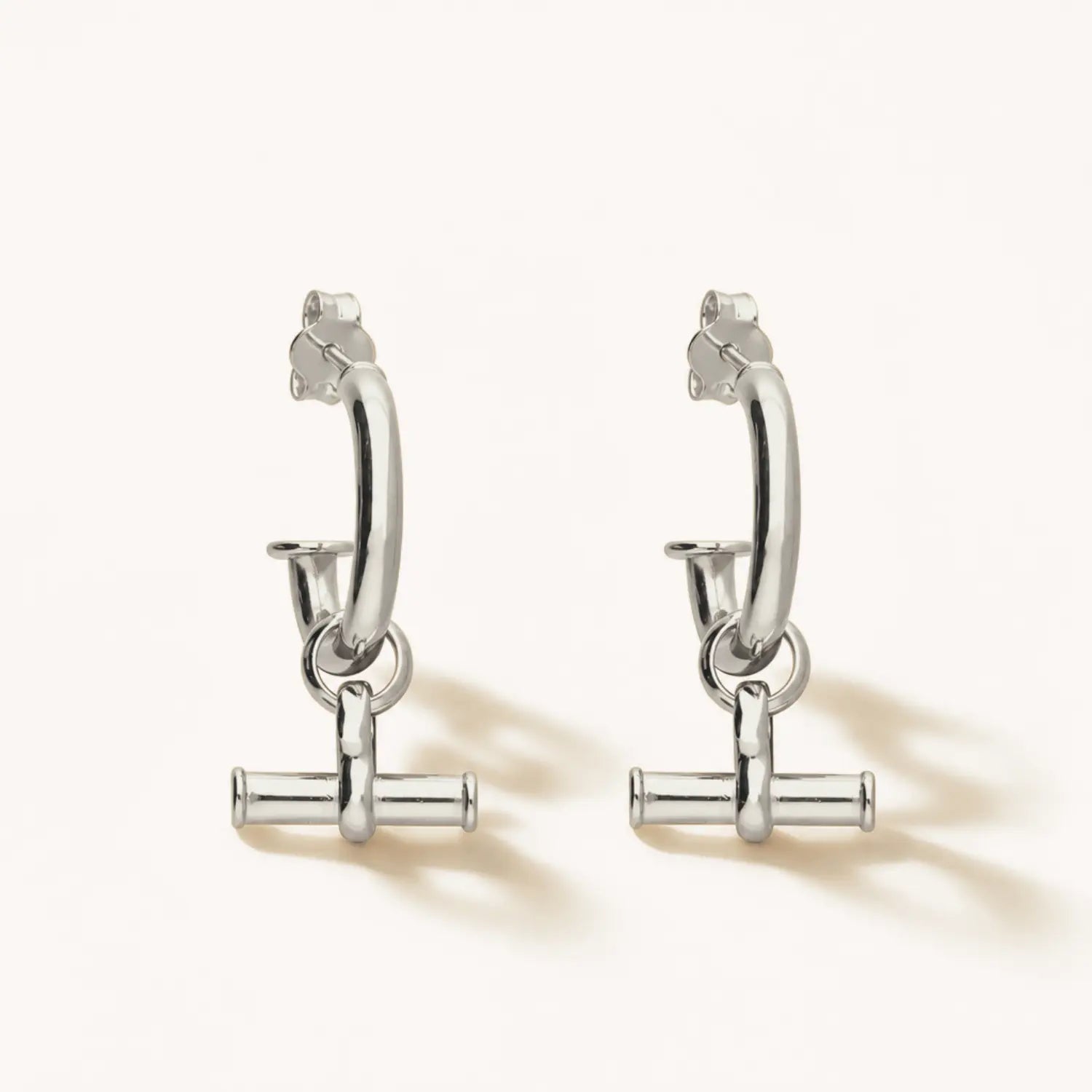 Shop T Bar Half Hoop Stud Earrings in gold vermeil or sterling silver. Minimal, handmade and perfect for everyday wear or layering. Free UK delivery over £75.