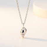 seashell necklace, ocean jewelry, shell pendant, silver coastal jewellery, nature inspired gift, beach lover gift, sustainable silver, Cornwall inspired, handcrafted necklace, seaside jewelry, marine life gift, beach day accessories, eco-friendly jewelry