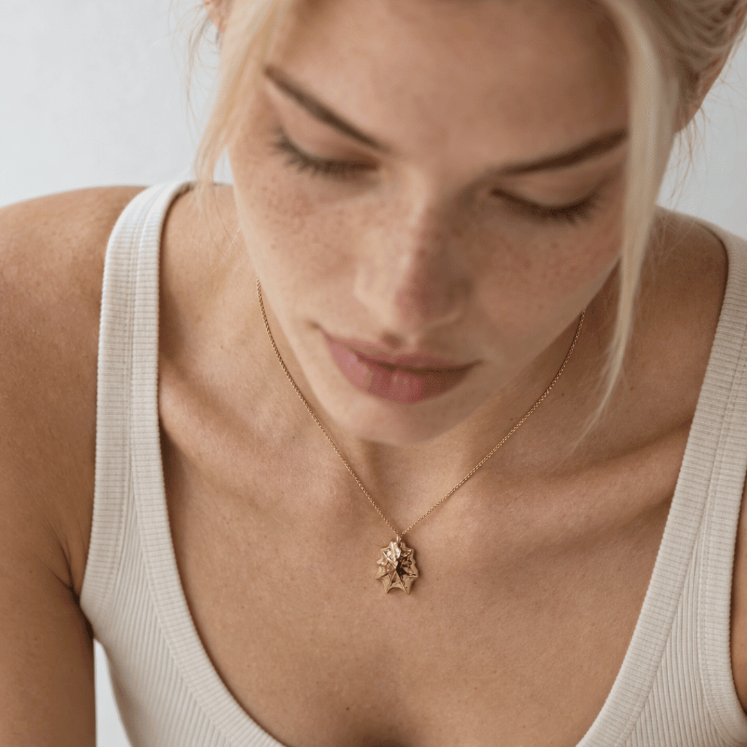 Solid 9ct yellow gold limpet seashell necklace with 1.5cm pendant on an 18 inch chain, handcrafted coastal fine jewellery by Dainty London