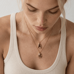 Solid 9ct yellow gold limpet seashell necklace with 1.5cm pendant on an 18 inch chain, handcrafted coastal fine jewellery by Dainty London