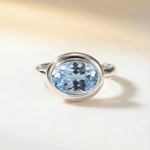 Oval - cut Sky Blue Topaz gemstone Ring - Avery - Dainty London