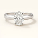 Platinum Oval Diamond Ring - The Isolde Ring - Dainty London platinum oval diamond ring, ethical lab-grown diamond, modern engagement ring, GIA certified diamond, luxury promise ring, contemporary anniversary jewellery, sustainable fine jewellry, oval cut diamond ring, ethical engagement gift, handcrafted diamond ring, timeless woman’s ring, special occasion jewelry, elegant promise ring