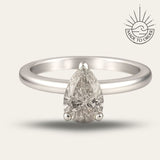 the Yara Ring - Engagement Rings UK under 1000 - Dainty London platinum pear diamond ring, ethical lab-grown diamond, white gold engagement ring, modern layered ring, boho pearl ring, sustainable luxury jewellery, handmade London ring, gift for her, contemporary estate ring, unique statement ring, natural brilliance jewellry, luxury ethical jewelry, layered stacking rings