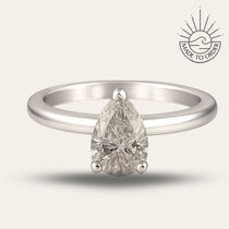 the Yara Ring - Engagement Rings UK under 1000 - Dainty London platinum pear diamond ring, ethical lab-grown diamond, white gold engagement ring, modern layered ring, boho pearl ring, sustainable luxury jewellery, handmade London ring, gift for her, contemporary estate ring, unique statement ring, natural brilliance jewellry, luxury ethical jewelry, layered stacking rings