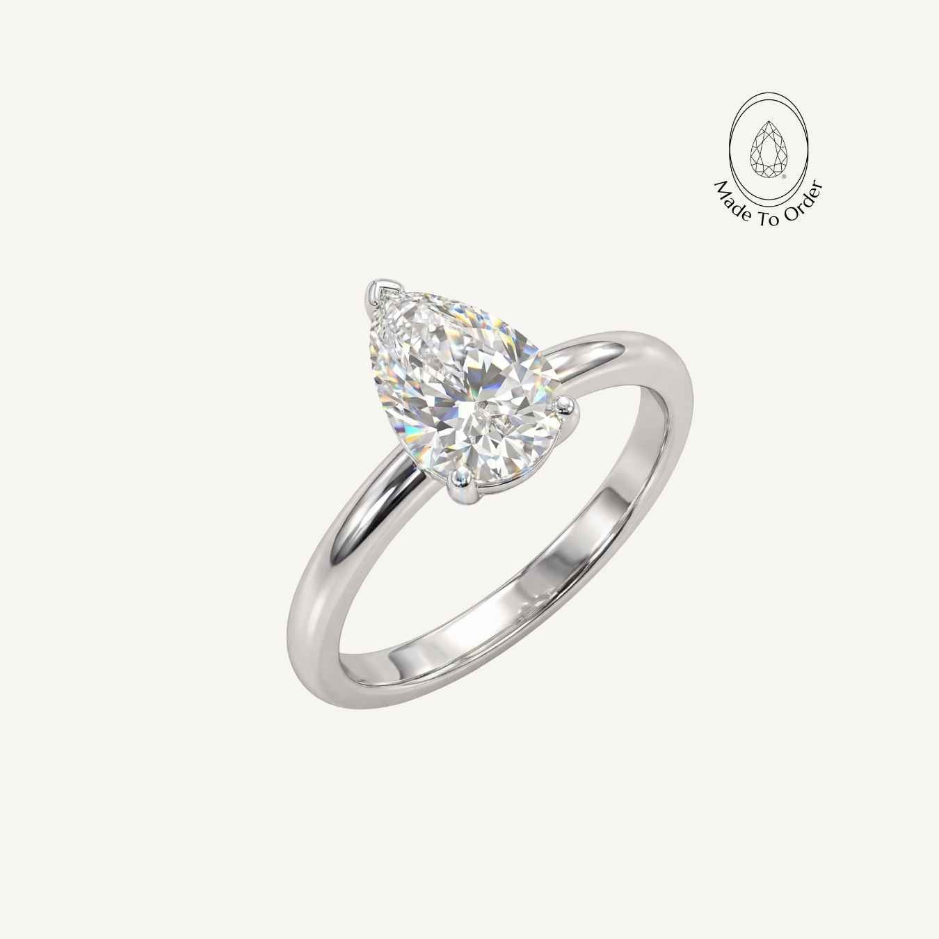 the Yara Ring - Engagement Rings UK under 1000 - Dainty London platinum pear diamond ring, ethical lab-grown diamond, white gold engagement ring, modern layered ring, boho pearl ring, sustainable luxury jewellery, handmade London ring, gift for her, contemporary estate ring, unique statement ring, natural brilliance jewellry, luxury ethical jewelry, layered stacking rings