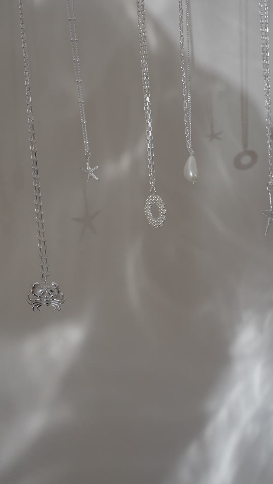 beach jewellery, starfish necklace, ocean charm, nautical jewellery, sea lover gift, sterling silver necklace, nature inspired jewelry, seaside accessory, coastal jewelry, beach gift for her, handcrafted sea charm, summer jewelry, ocean lover gift