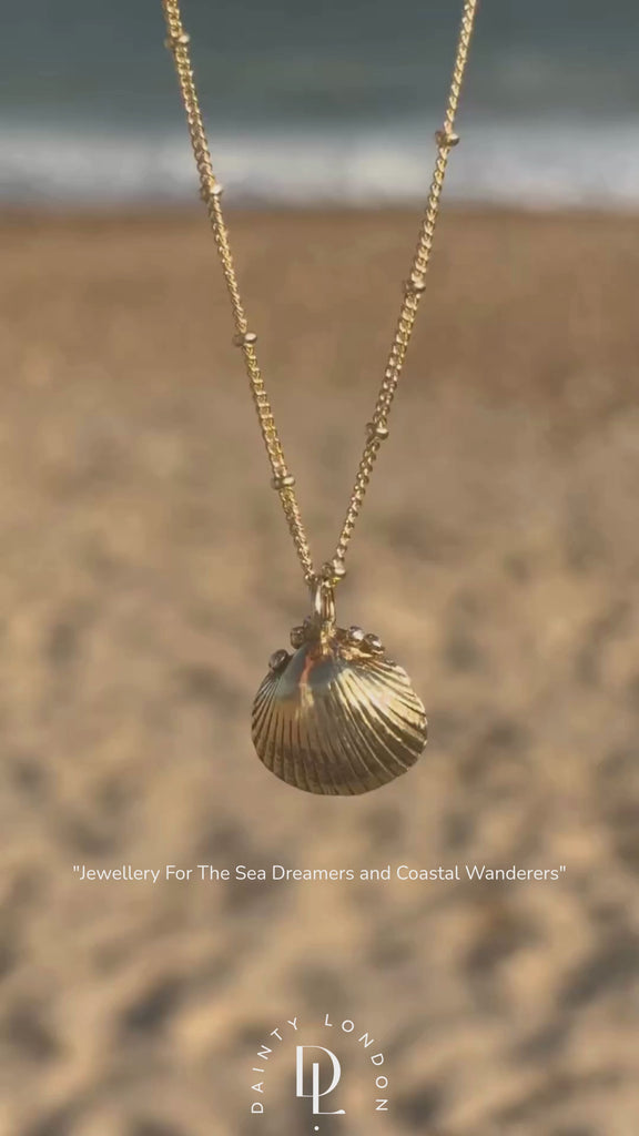Solid Gold Seashell Necklace - Luxury layered necklaces - Dainty London solid gold seashell necklace, beach jewellery, coastal jewellry, mermaid jewelry, ocean inspired necklace, fairtrade gold necklace, seaside gift, handcrafted gold necklace, beach lover gift, sea shell pendant, summer jewelry, mermaid gift, ocean lover jewelry
