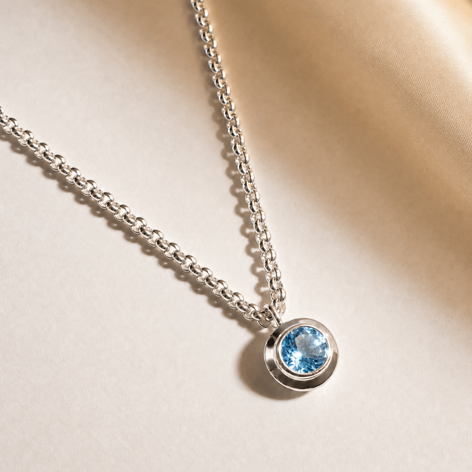 blue topaz necklace, sky blue gemstone jewelry, sterling silver pendant, statement chain necklace, handcrafted gold jewelry, eco-friendly necklace, layered jewelry piece, gift for her, boho chic necklace, beach style jewelry, summer accessories, special occasion gift