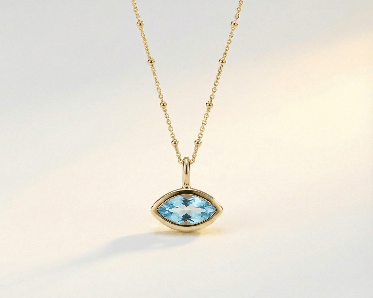 Siren’s Teardrop necklace with marquise sky blue topaz pendant