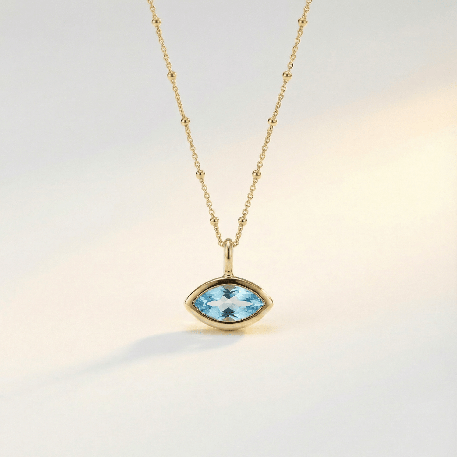 Siren’s Teardrop necklace with marquise sky blue topaz pendant