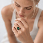 Elara green emerald ring in solid 9ct gold with an 11x9mm octagonal Hydrothermal Emerald gemstone, handcrafted by Dainty London