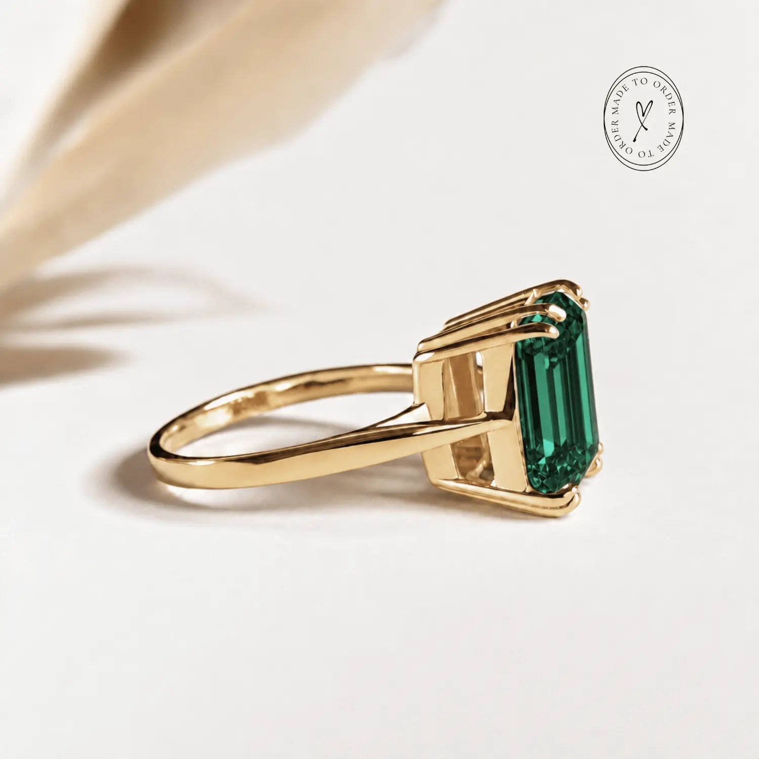 Elara green emerald ring in solid 9ct gold with an 11x9mm octagonal Hydrothermal Emerald gemstone, handcrafted by Dainty London