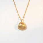 Solid Gold Seashell Necklace for Lovers of the Sea - Dainty London