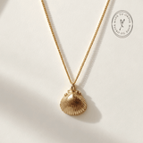 Solid Gold Seashell Necklace for Lovers of the Sea - Dainty London gold seashell necklace, coastal jewelry, ocean pendant, nature inspired jewelry, Cornwall seaside gift, beach lover gift, mermaid jewelry, ocean lover necklace, handmade coastal jewelry, star charm necklace, sustainable jewelry, beach cottage style, meaningful coastal gift