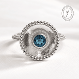 Sora London Blue Topaz ring in sterling silver and 18ct gold vermeil with barnacle granulation detail and 5mm blue topaz bezel setting, Dainty London

